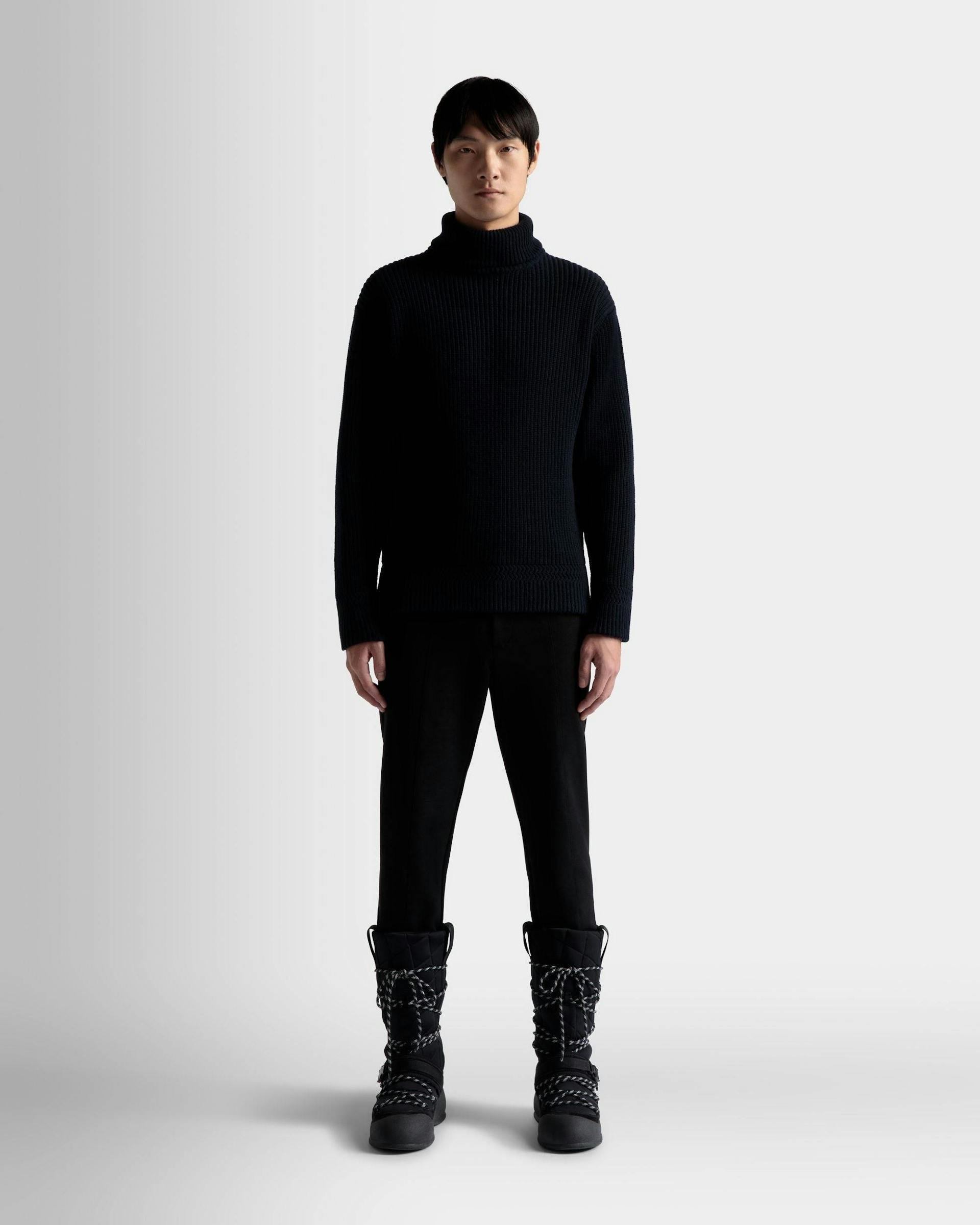 Men's Turtleneck Sweater In Dark Blue Wool | Bally | On Model Front