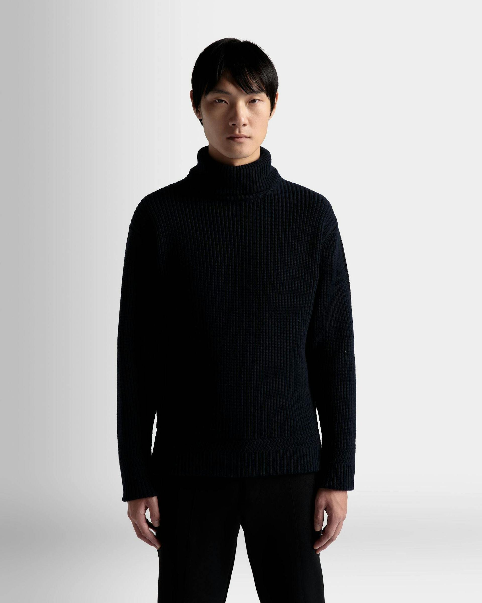 Men's Turtleneck Sweater In Dark Blue Wool | Bally | On Model Close Up