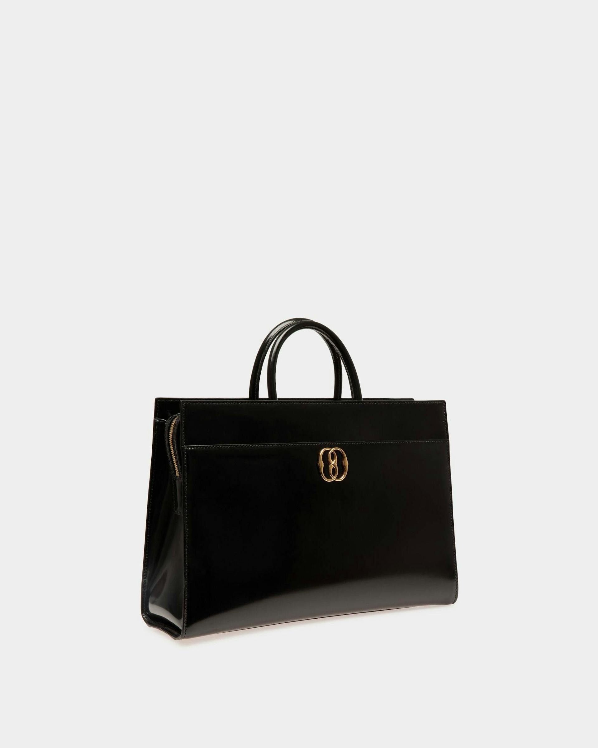 Women's Emblem Tote Bag In Black Patent Leather | Bally | Still Life 3/4 Front