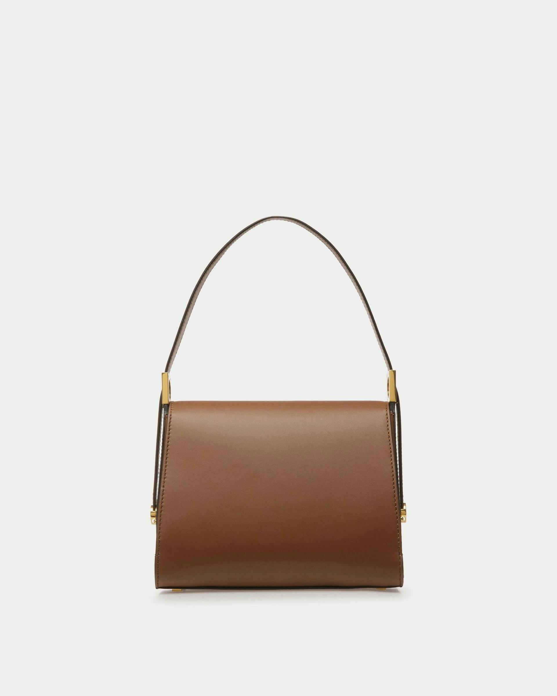Women's Emblem Top Handle Bag In Brown Leather | Bally | Still Life Back