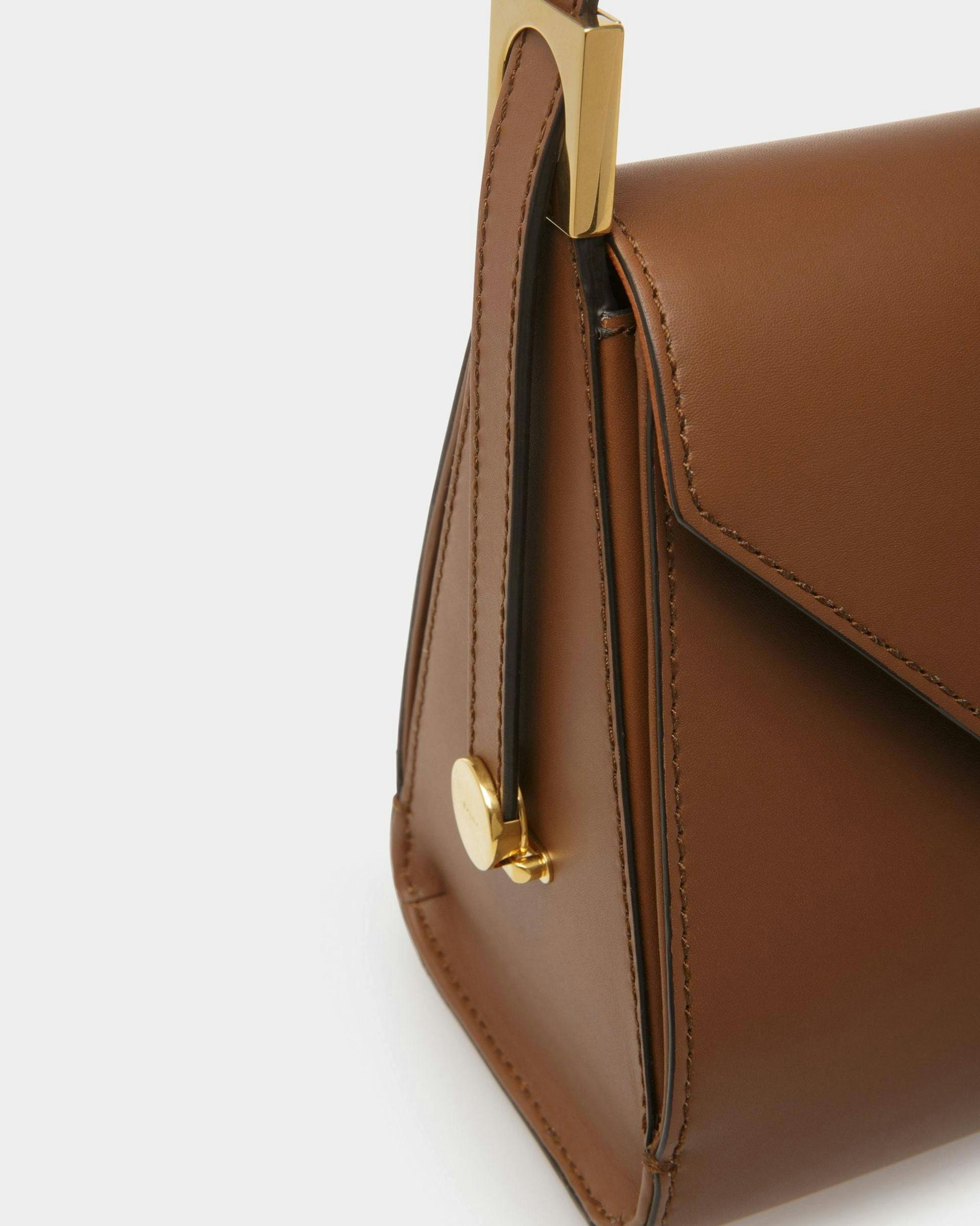 Women's Emblem Top Handle Bag In Brown Leather | Bally | Still Life Detail